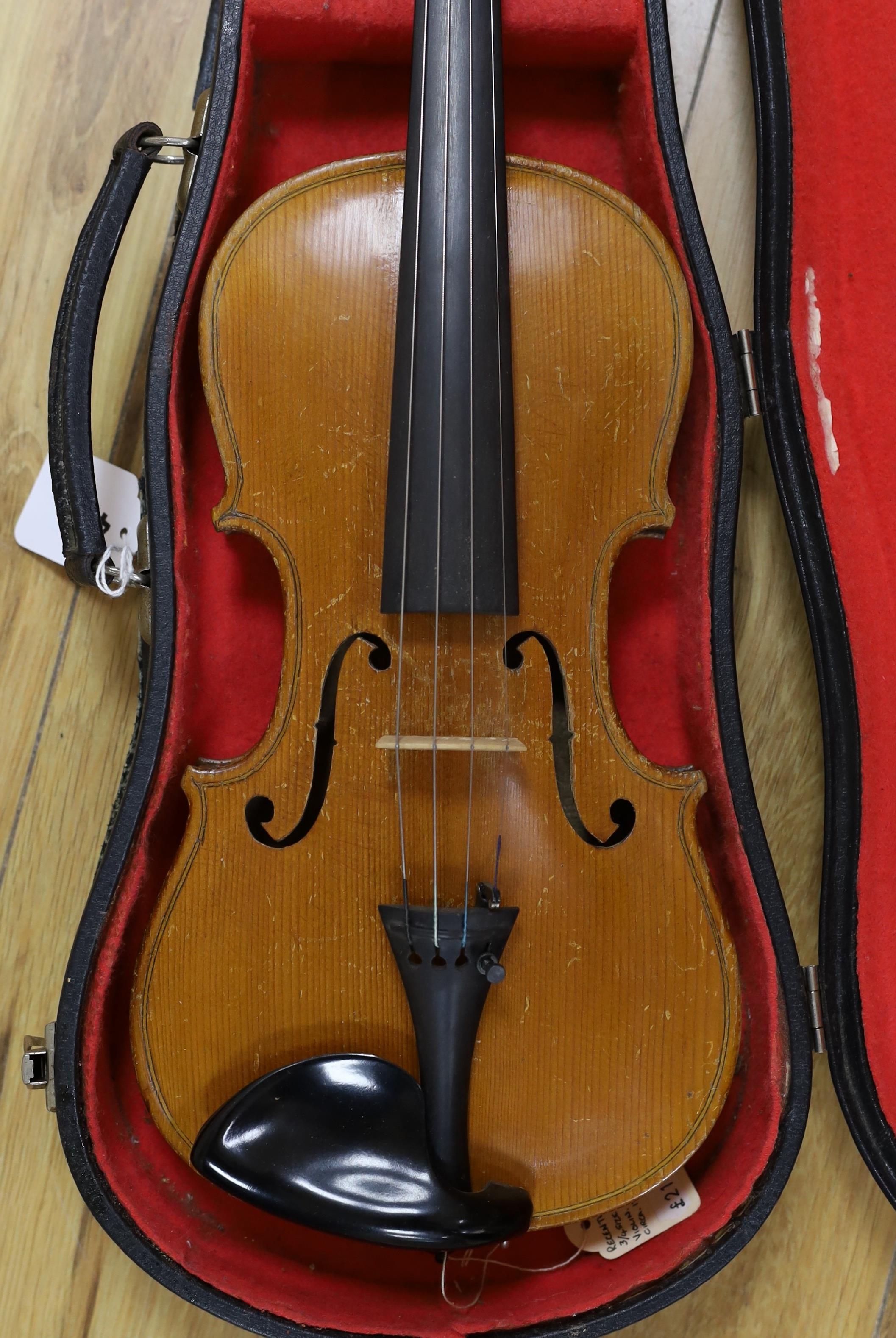 A cased student's violin, length of back 33 cm